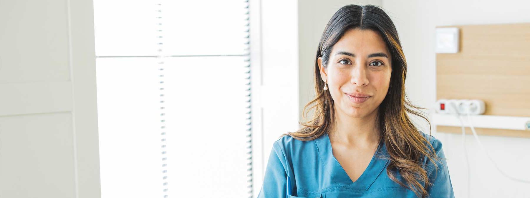 Nursing student in scrubs